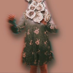 Teal free people dress with beautiful tan embroidery details has pockets!